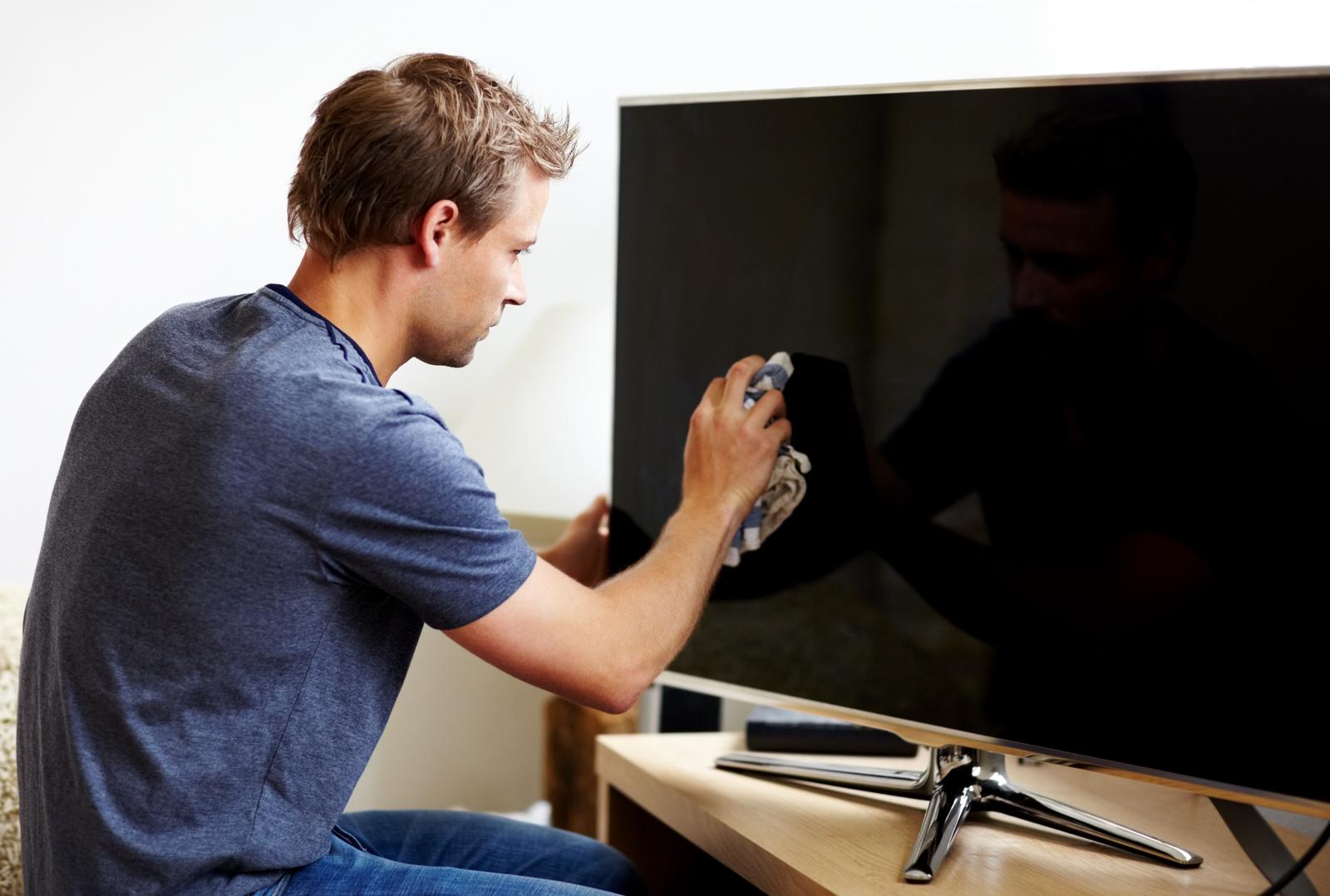 Een beamer of TV in je home cinema